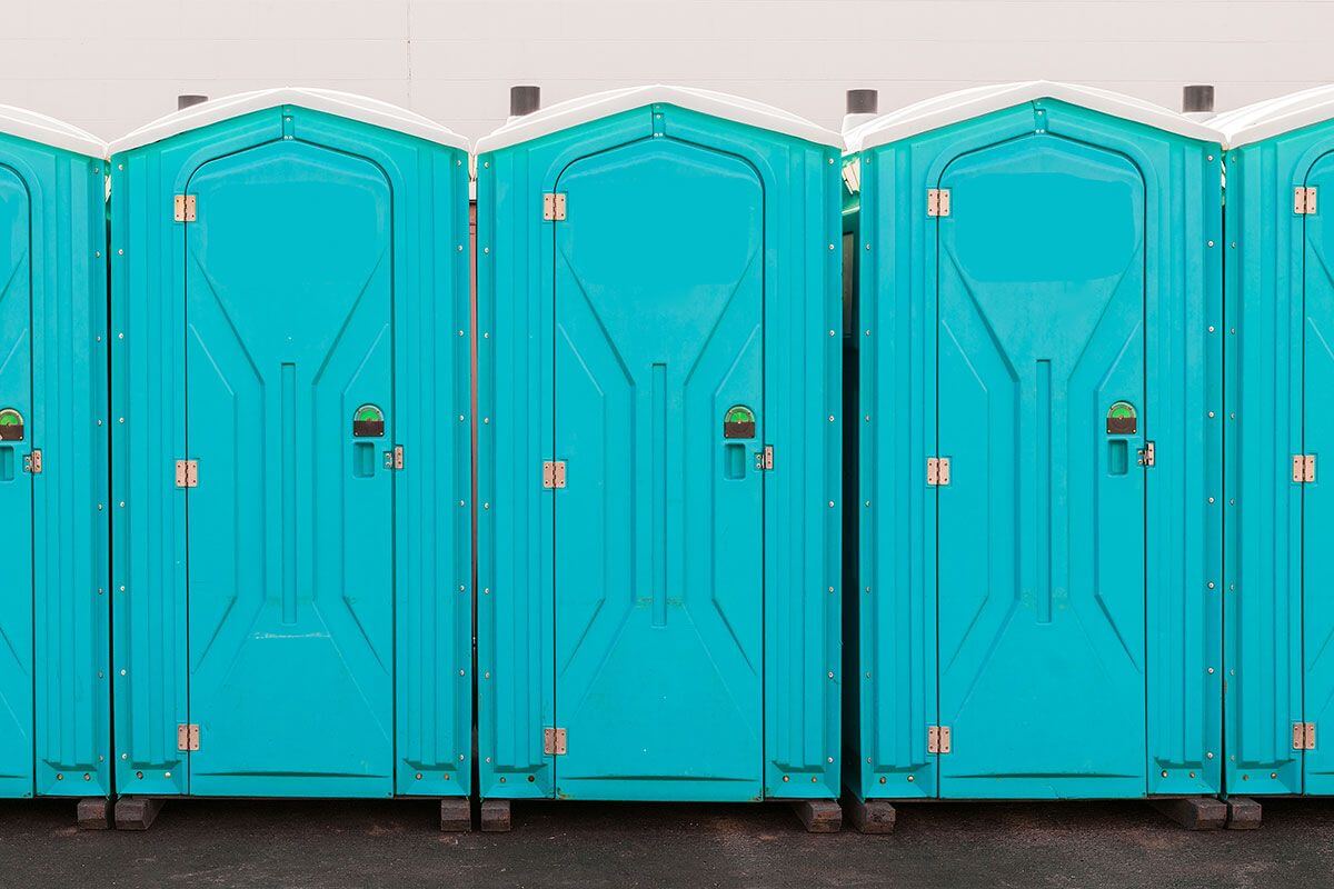 Industrial portable restroom units at a plant in Concord, New Hampshire